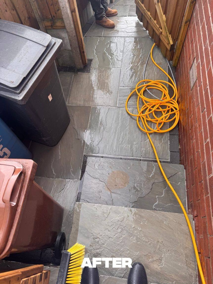 Commercial bin store area after pressure washing in Manchester