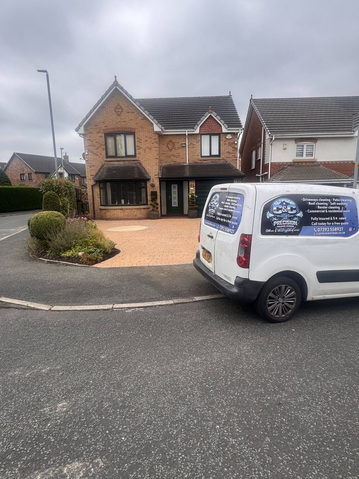 C&C Precision van outside a Tameside home before a driveway cleaning job on a pattern imprinted concrete driveway
